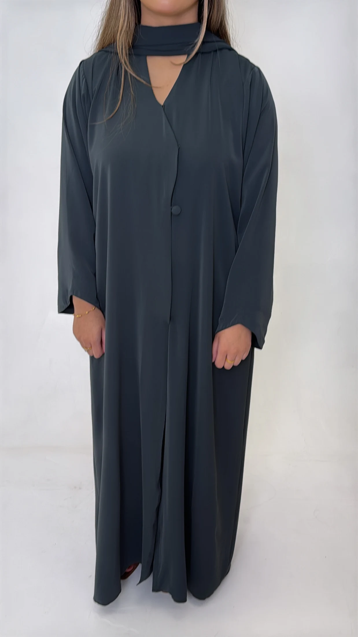 Front view of a charcoal abaya, with garment length, chest and sleeve measurement positions indicated.